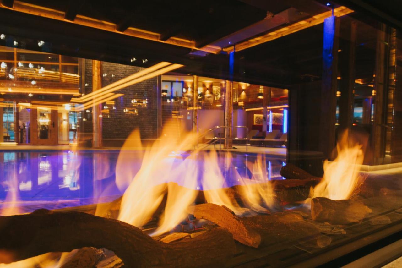Ortner'S Resort Bad Füssing Εξωτερικό φωτογραφία The fireplace at the lobby